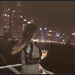 Army green jacket with leather sleeves